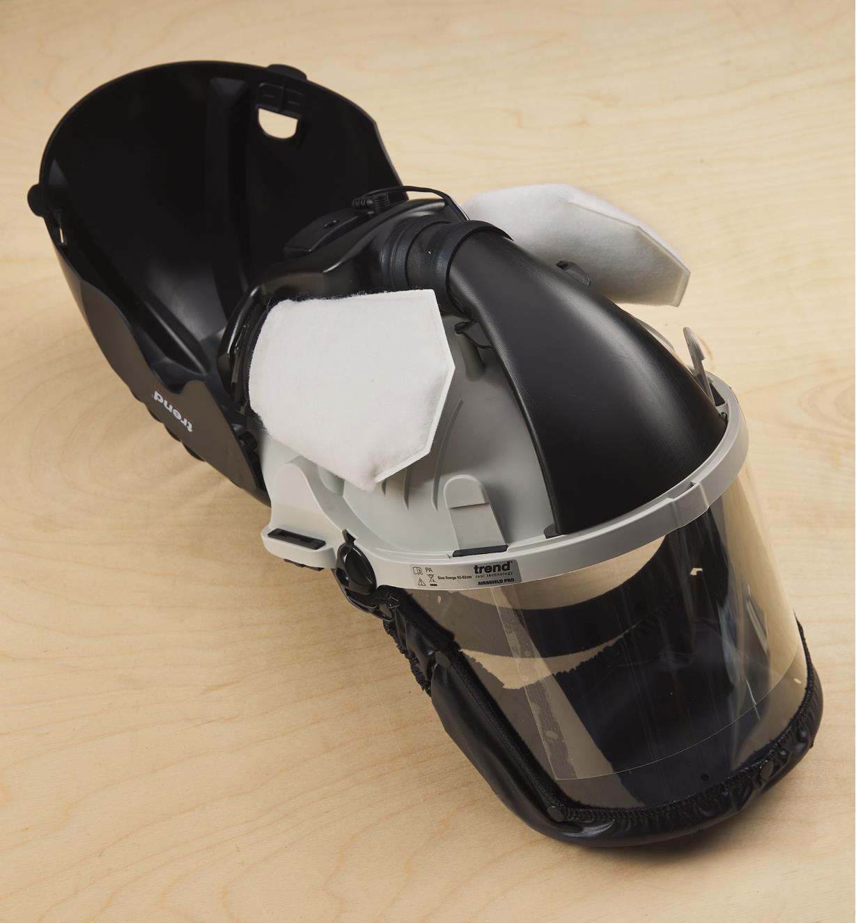 Air filters inside the top of an open helmet