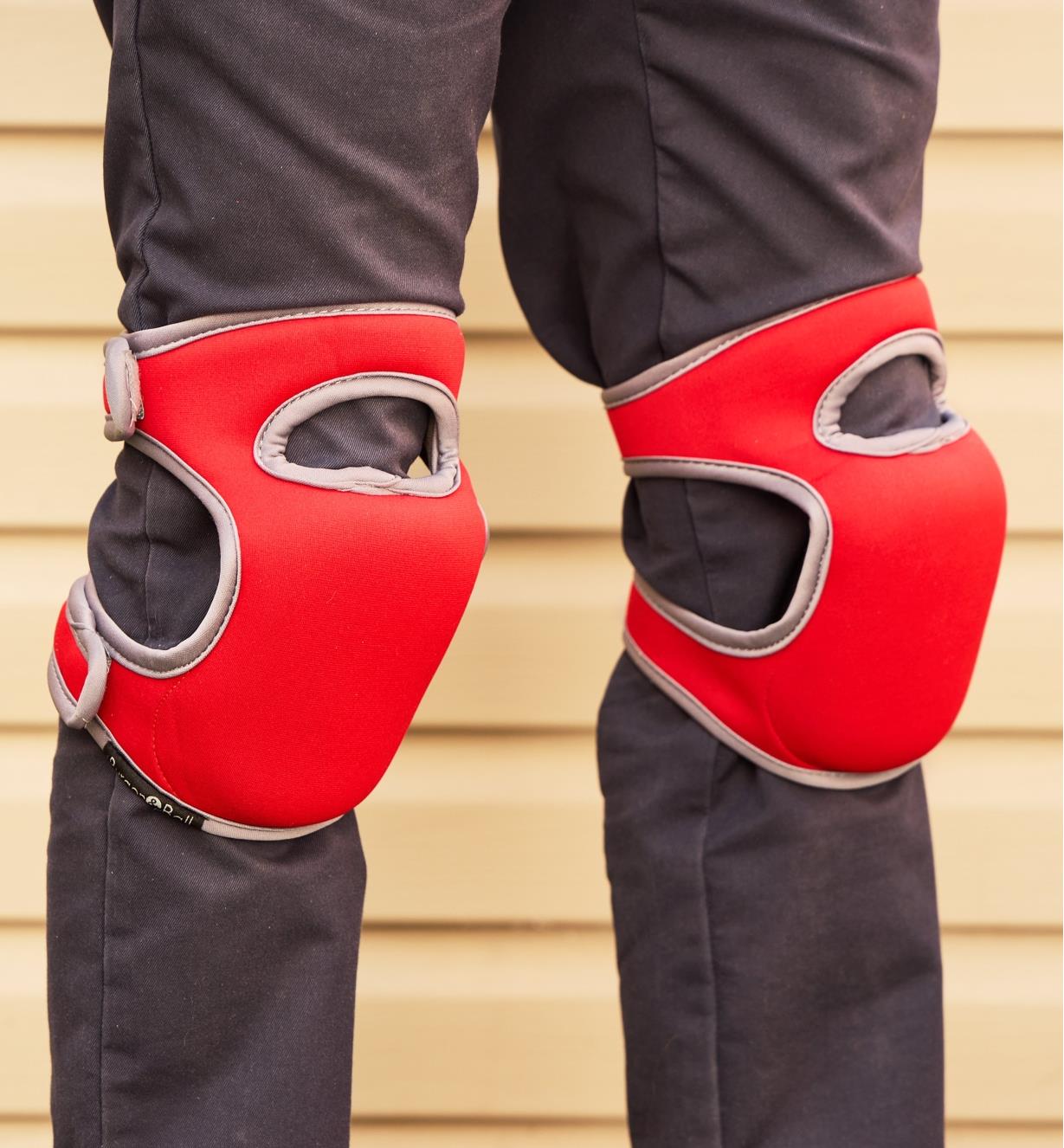 Front view of a person wearing memory foam knee pads