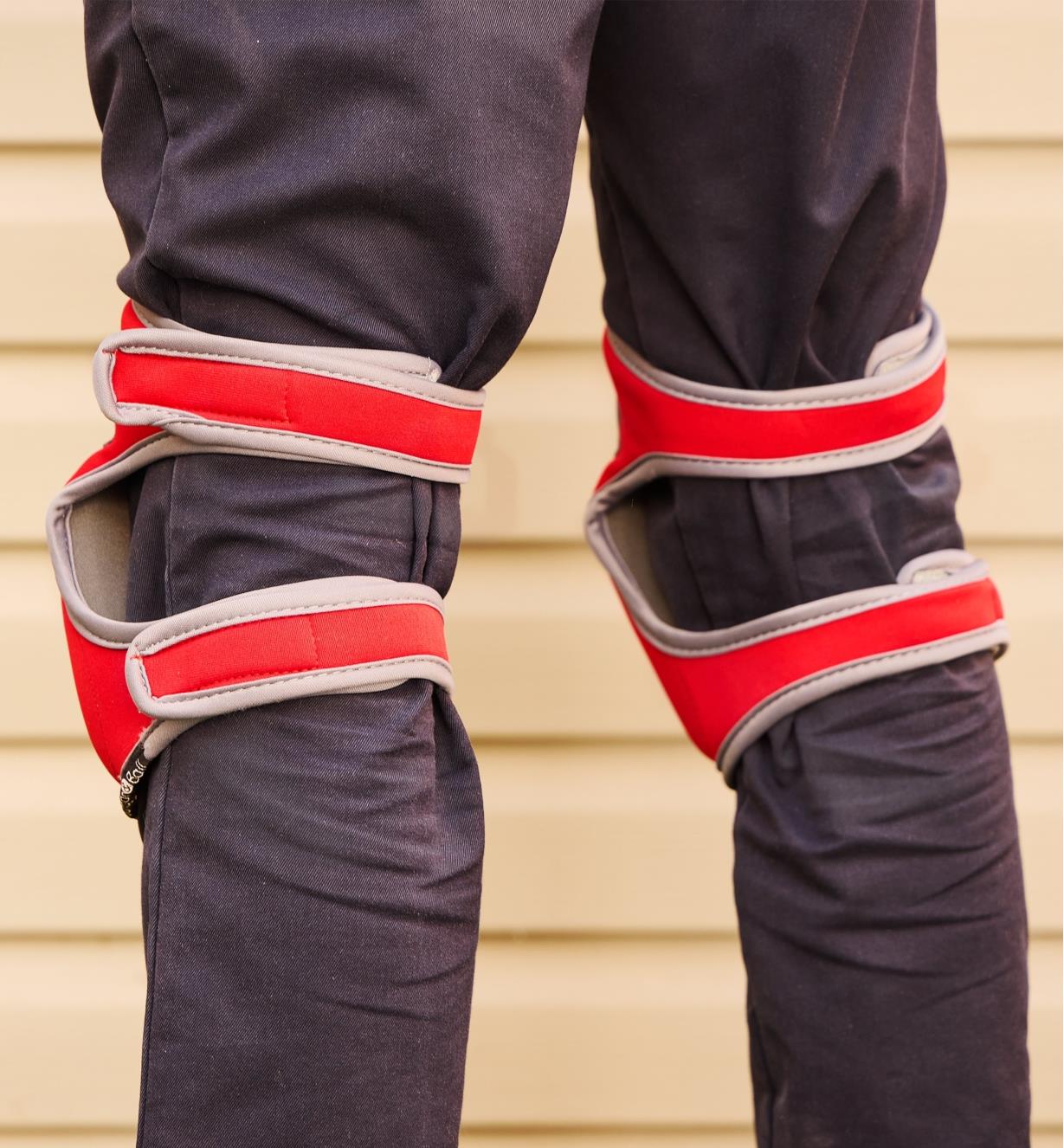 Rear view of a person wearing memory foam knee pads