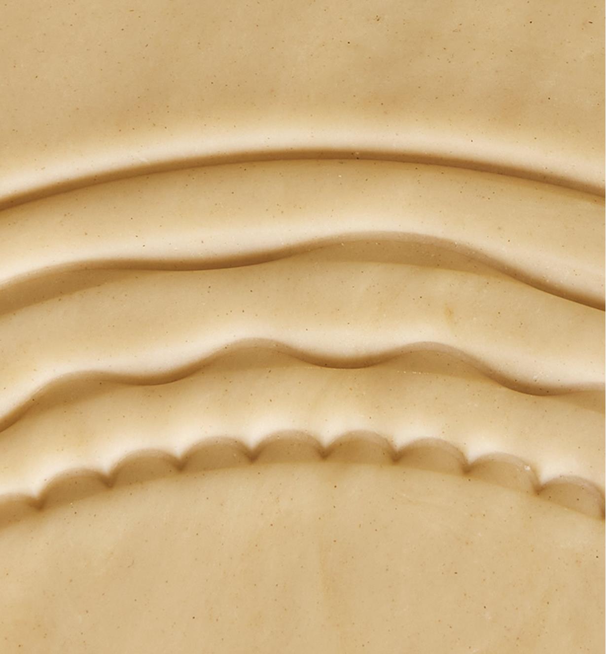 Four different patterns cut into dough