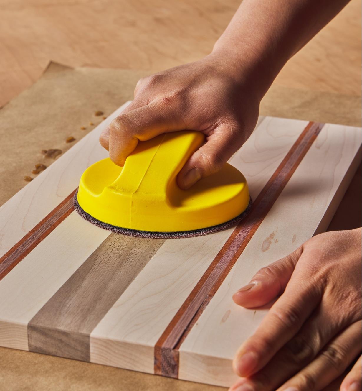 Sanding the cutting board