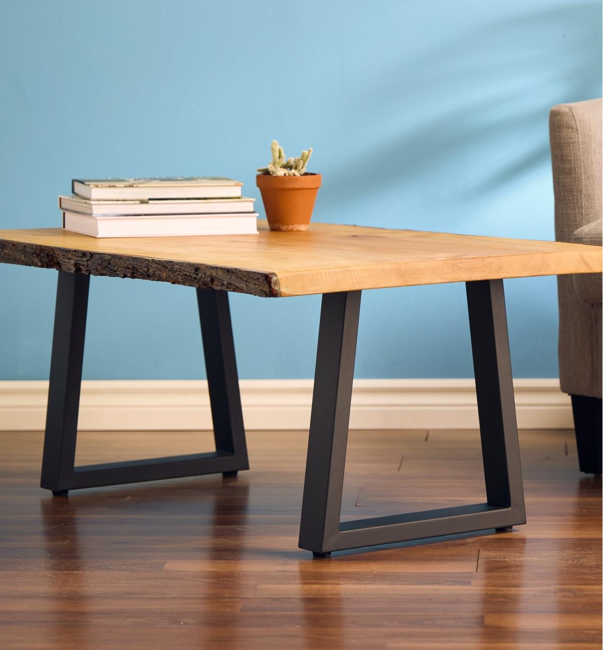 Example of completed table using trapezoidal legs and a wooden top