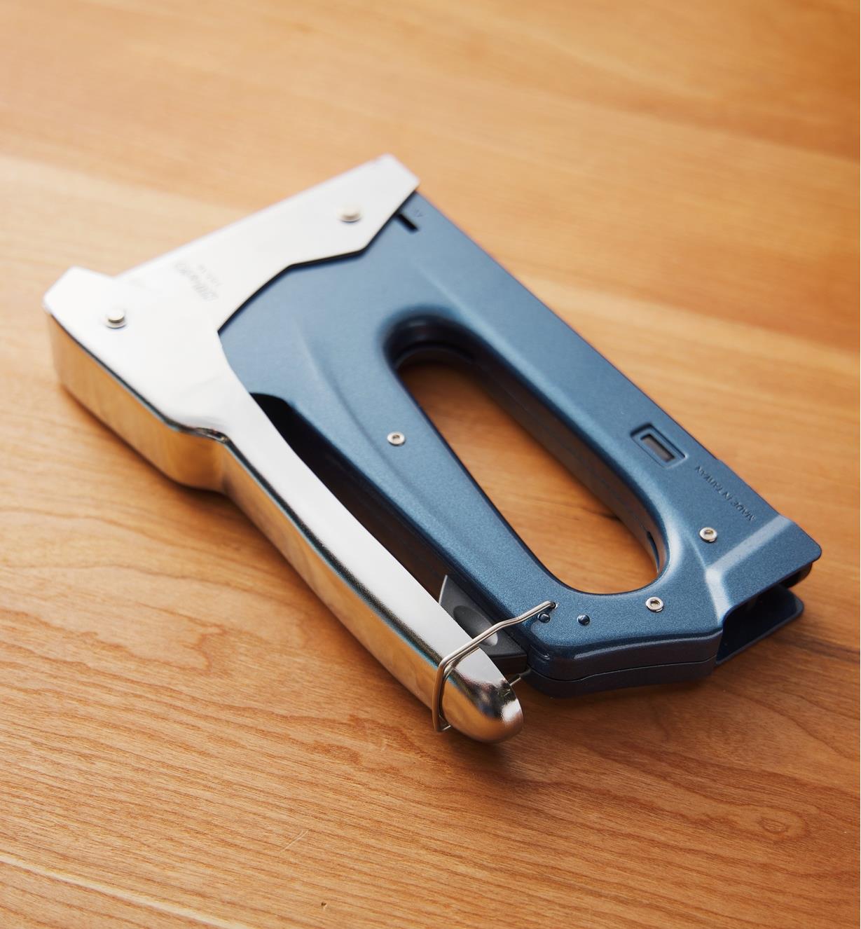 A staple gun with the lock on the handle
