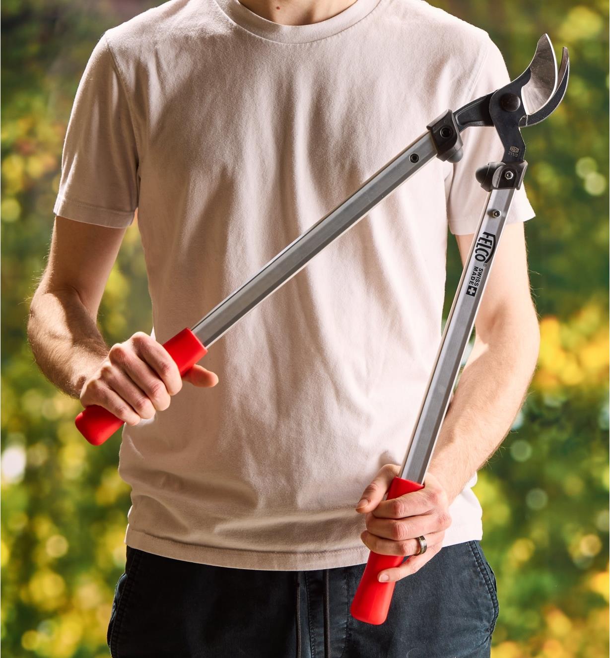 A gardener holds the Felco #211 loppers upright