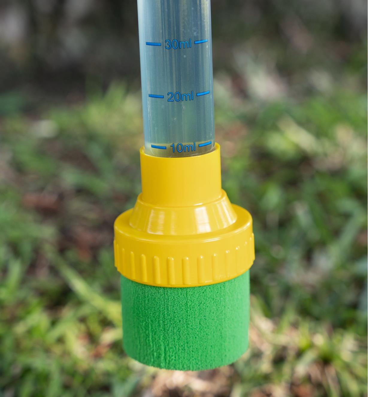 A close-up view of the sponge tip on the end of the weedstick