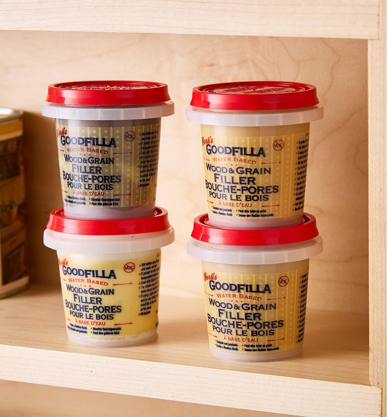 A selection of four GoodFilla Wood Filler products sits on a shelf