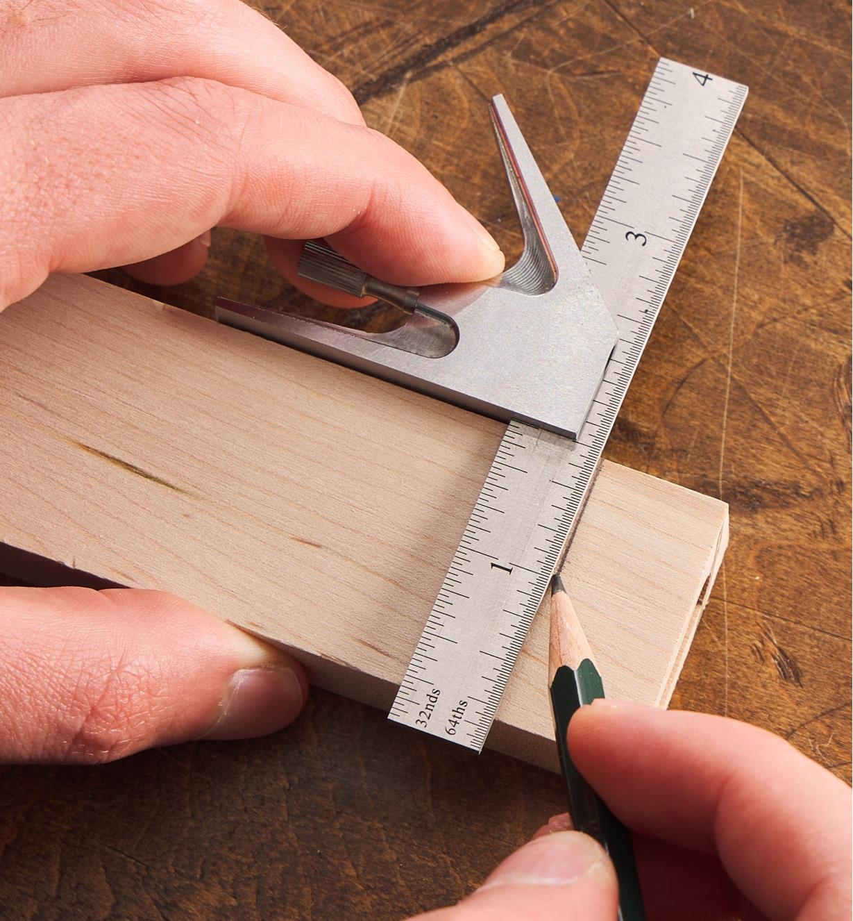 Using a 4" combination square to mark a pencil line at a consistent offset from a workpiece edge