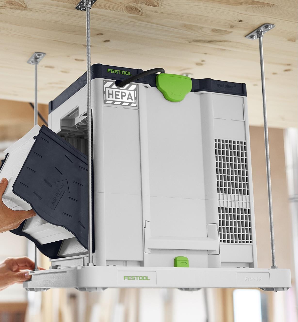 A Festool DH-SYS-AIR purifier suspended from the ceiling